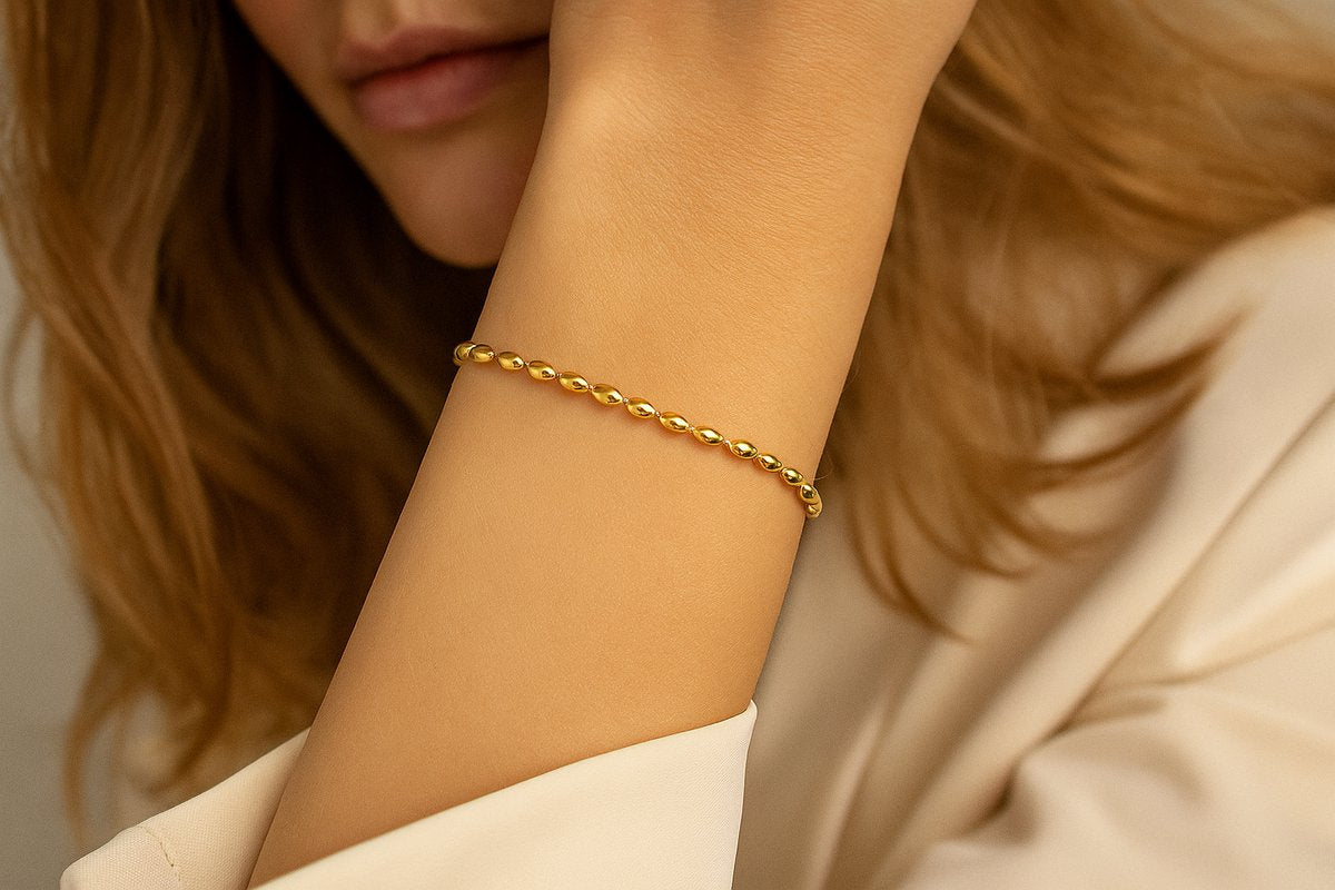 Luxe Armband Dames Schakel Goudkleurig – Schakelarmband met Ovale Kralen – Verstelbaar