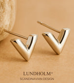 Lundholm Viva oorknopjes zilverkleurig, close-up