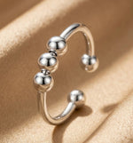 Lundholm Mira fidget ring met bolletjes zilverkleurig