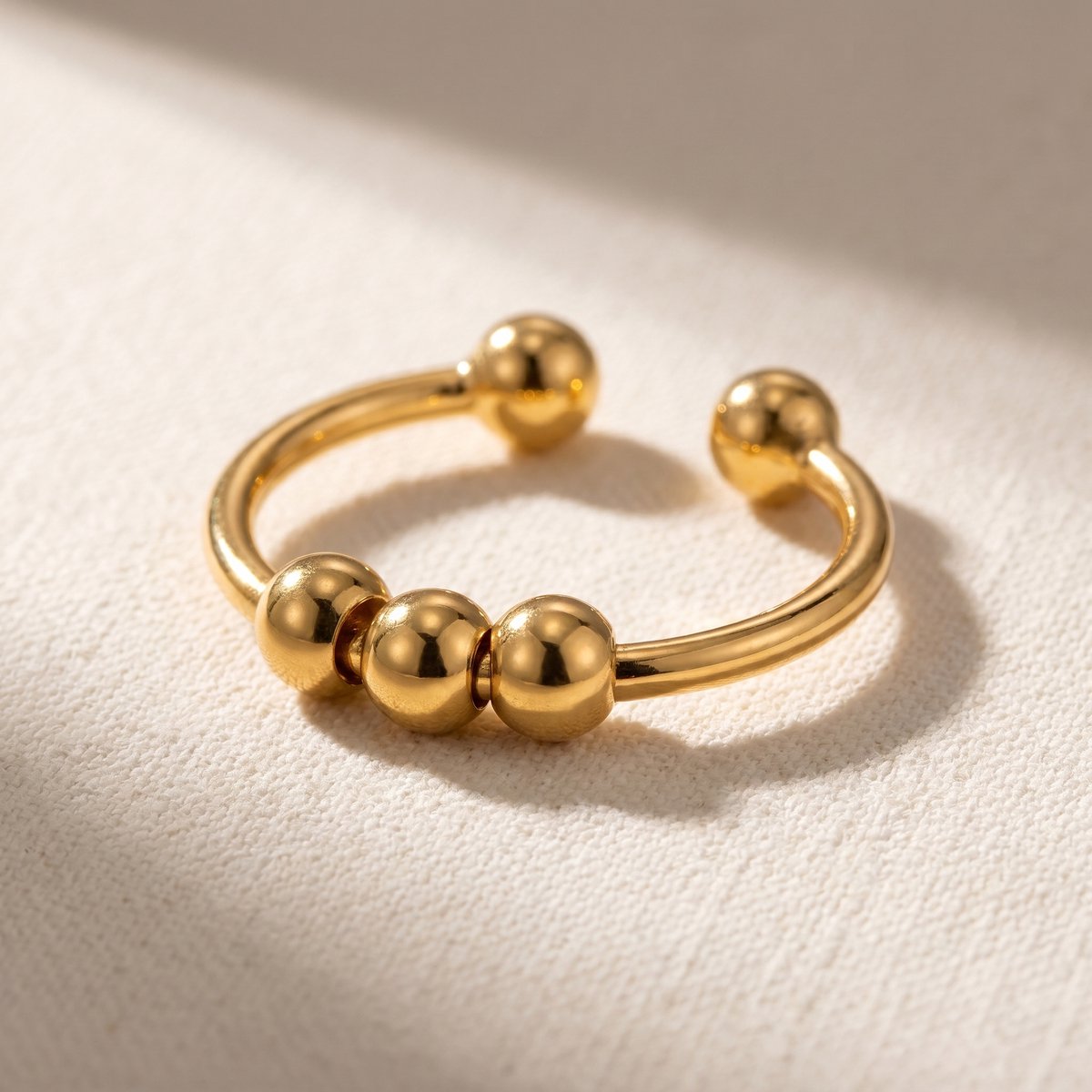Lundholm Mira fidget ring met bolletjes goudkleurig