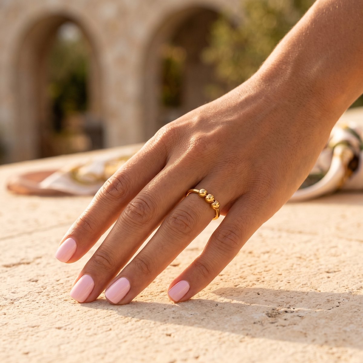 Lundholm Mira fidget ring met bolletjes goudkleurig 2