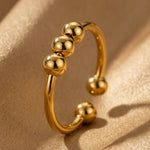 Lundholm Mira fidget ring met bolletjes goudkleurig 3