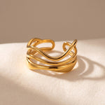 Lundholm Phoenix ring goud op stof - gelaagd open design waves ring dames