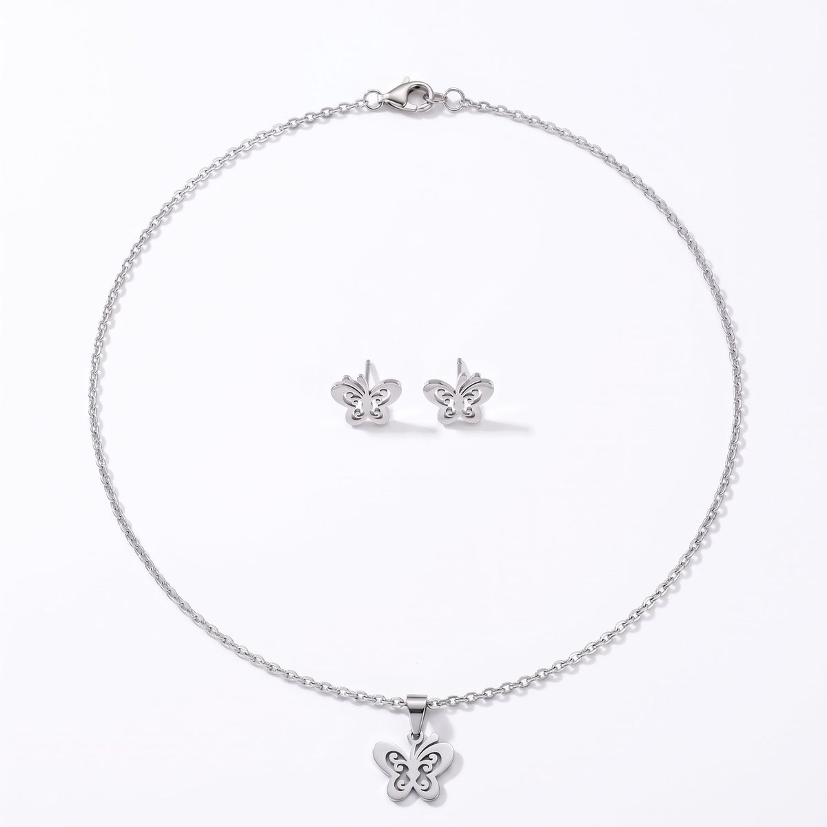 Lundholm Edda vlinder ketting en oorknopjes zilver