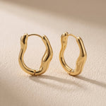 Iselin Oorbellen Stainless Steel Chunky Golvende Oorringen 2,5 cm Goudkleurig foto 5