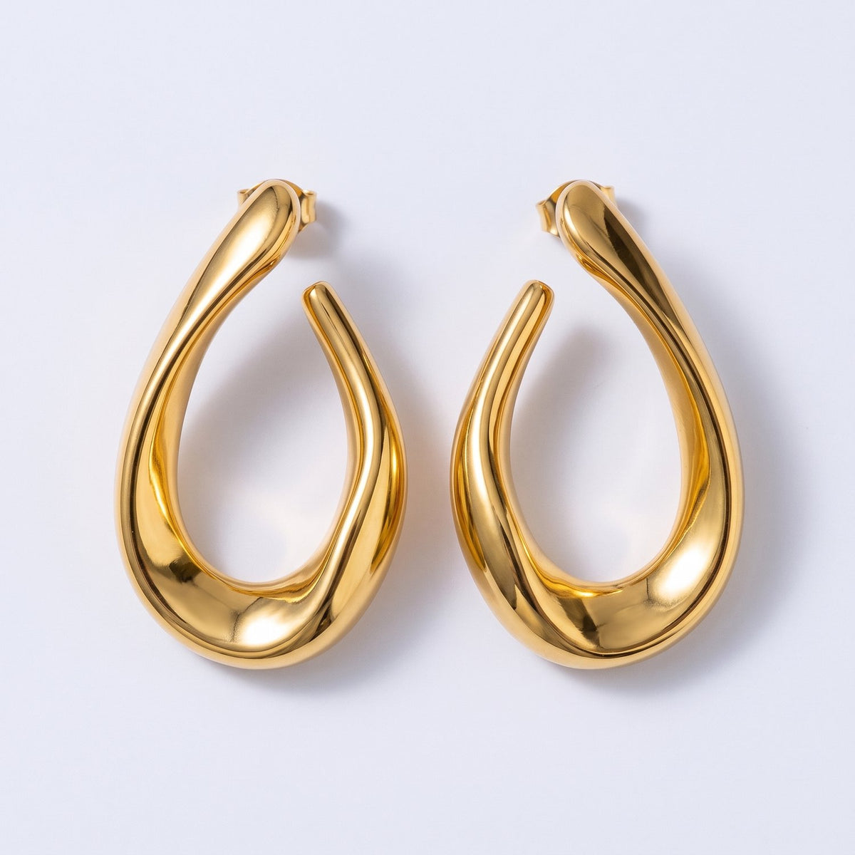 Lundholm Iris geometrische twist oorbellen goudkleurig