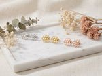 Lundholm Pia oorknopjes roségoud Bloem des Levens — detail Flower of Life sieraad