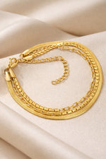 Lundholm Lianne armband goud detail — meerdere fijne schakels luxe layered armband