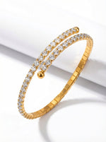 Lundholm luxe armband dames goudkleurig met zirkonia steentjes - bangle tennis armband - premium stainless steel gold plated - Yael Serie - Scandinavisch design sieraad cadeau voor vrouw verjaardag moederdag