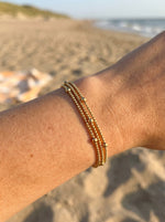 Lundholm Alina goudkleurige laagjes armband – waterproof en hypoallergeen