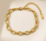 Lundholm Ellen schakelarmband goud close-up — 18K verguld stainless steel verstelbare damesarmband Scandinavisch design