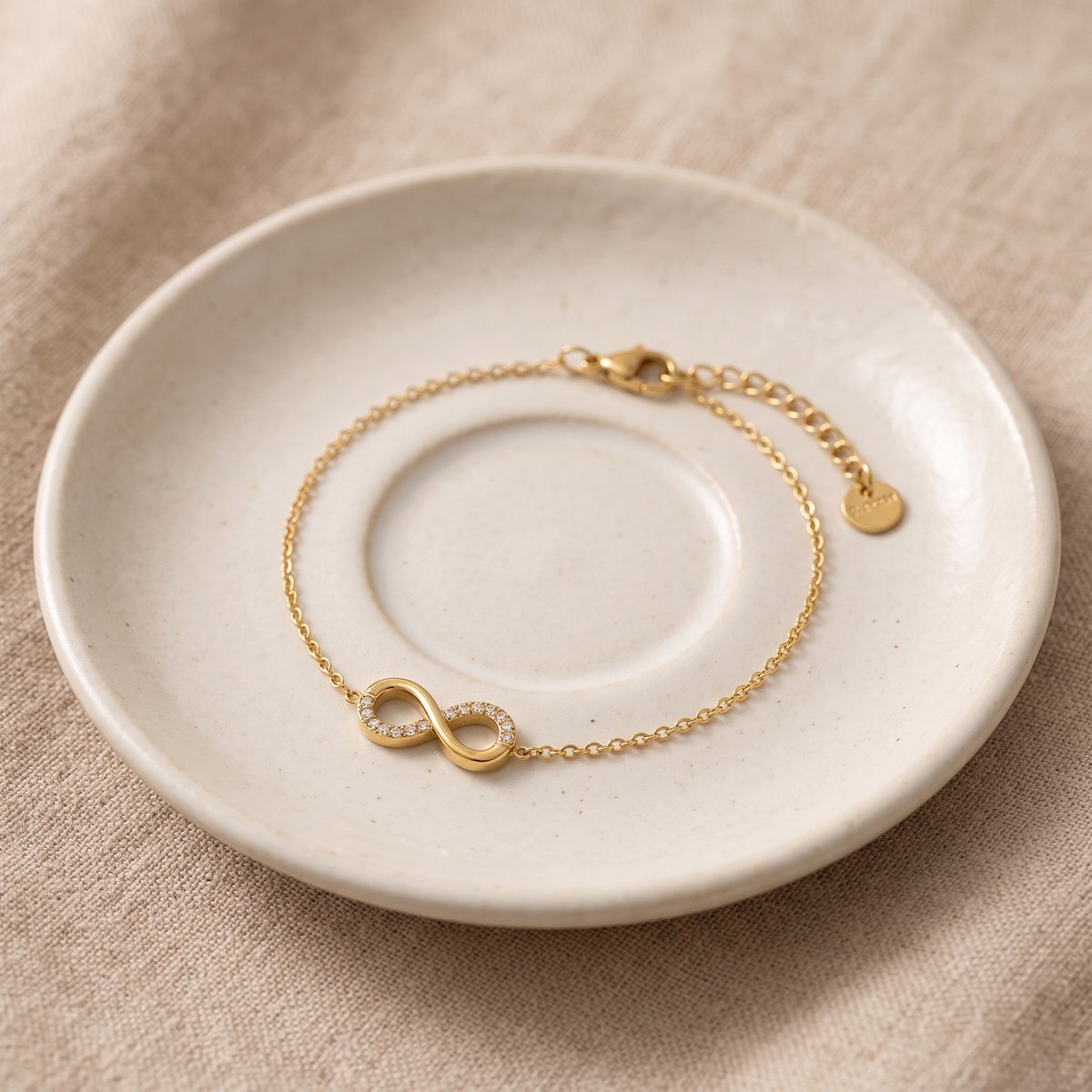 Lundholm Dee armband goud met oneindigheidsteken – verstelbaar 18 + 4 cm