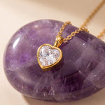 Lundholm Emma ketting goud detail schakels en hartje hanger — luxe Scandinavisch design dames
