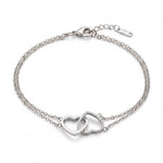 Lundholm Evie armband dames zilverkleurig – dubbele schakelarmband met twee verbonden hartjes, stainless steel