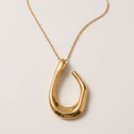 Lundholm Iris ketting goudkleurig met organische hanger