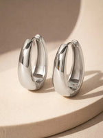 Lundholm Lea chunky luxe oorringen dames zilver — premium stainless steel waterproof anti-allergie Scandinavisch design