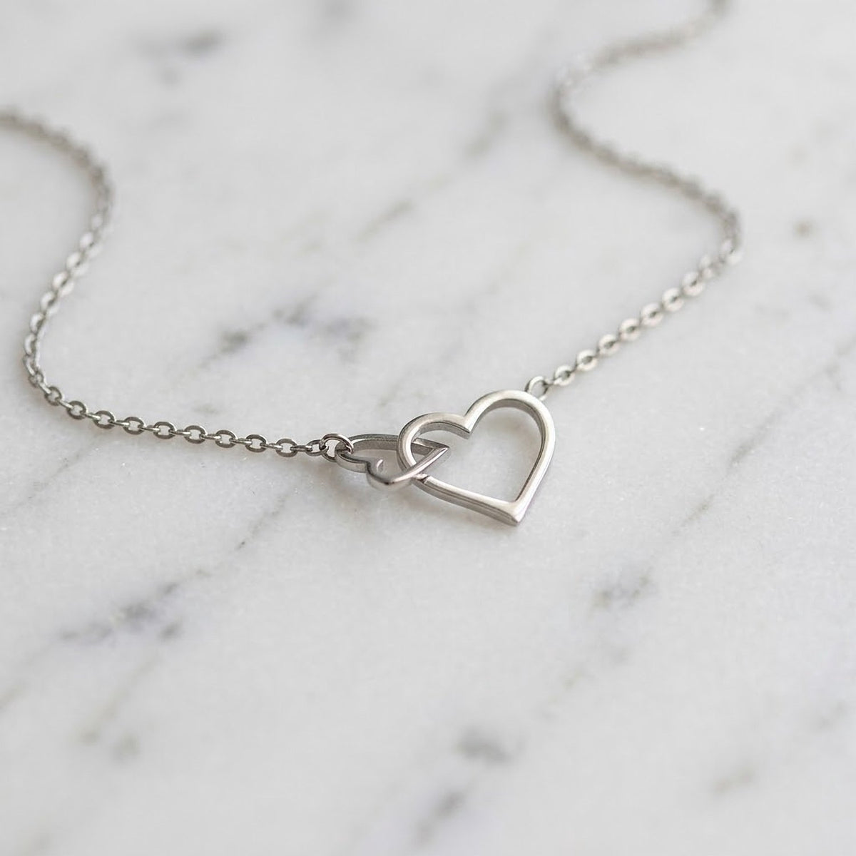 Lundholm Lieve ketting dames zilverkleurig met verbonden hartjes