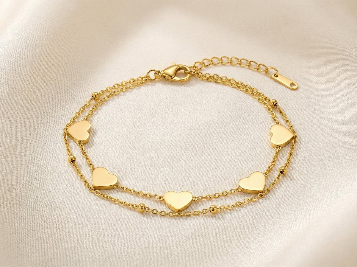Lundholm Lisan armband goudkleurig dubbellaagse bedelarmband met hartjes en balletjes productfoto, premium stainless steel sieraad