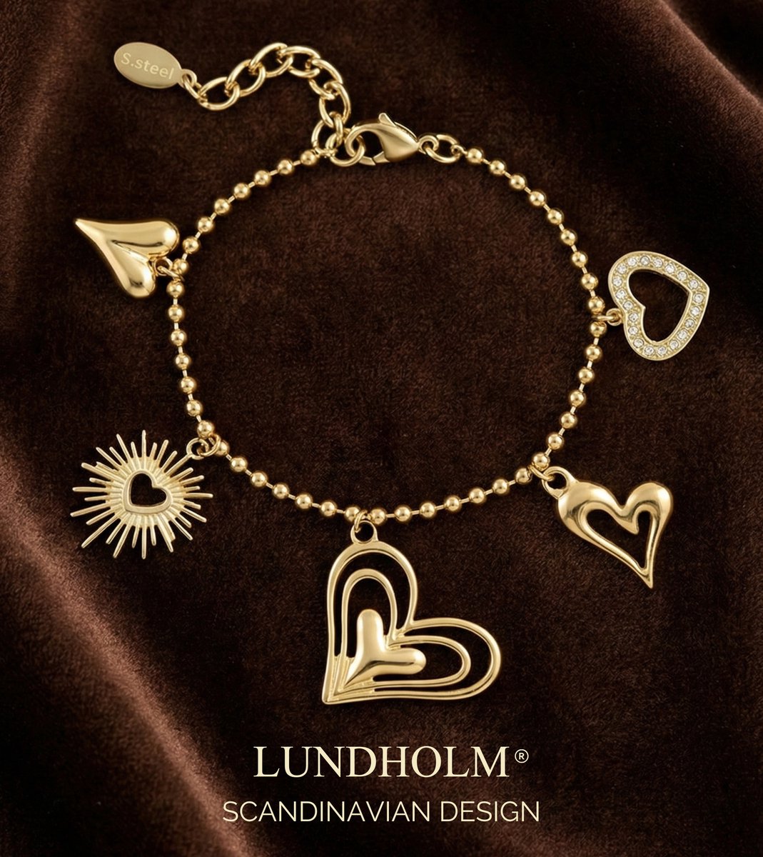 Lundholm luxe schakelarmband My Love met hartjes bedels in goudkleurig, Scandinavian Design productfoto