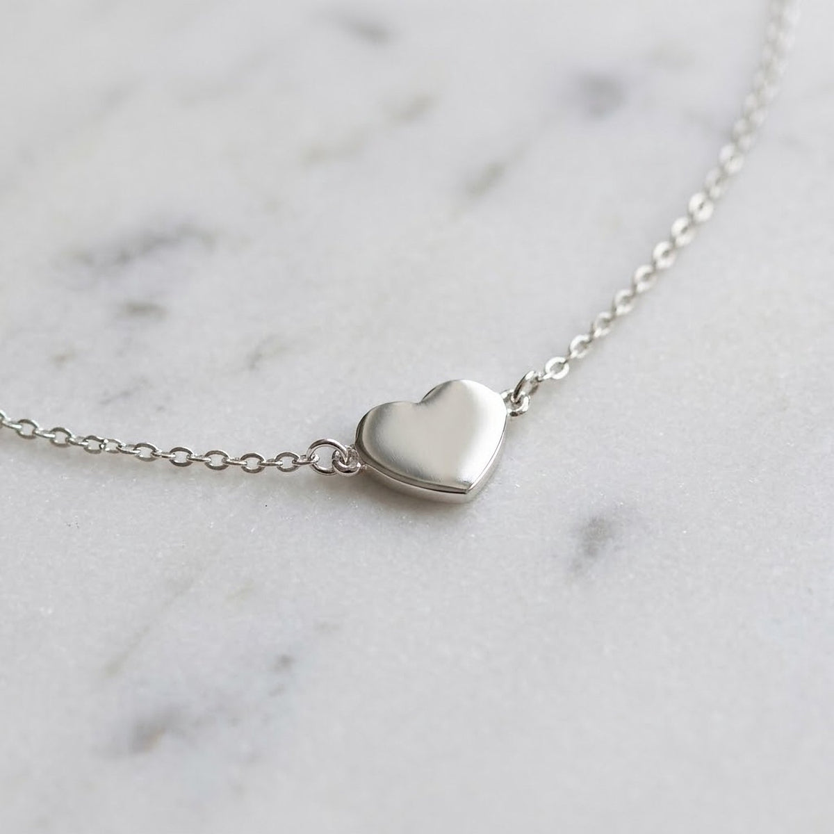 Lundholm Marthe minimalistische zilveren hartjes ketting