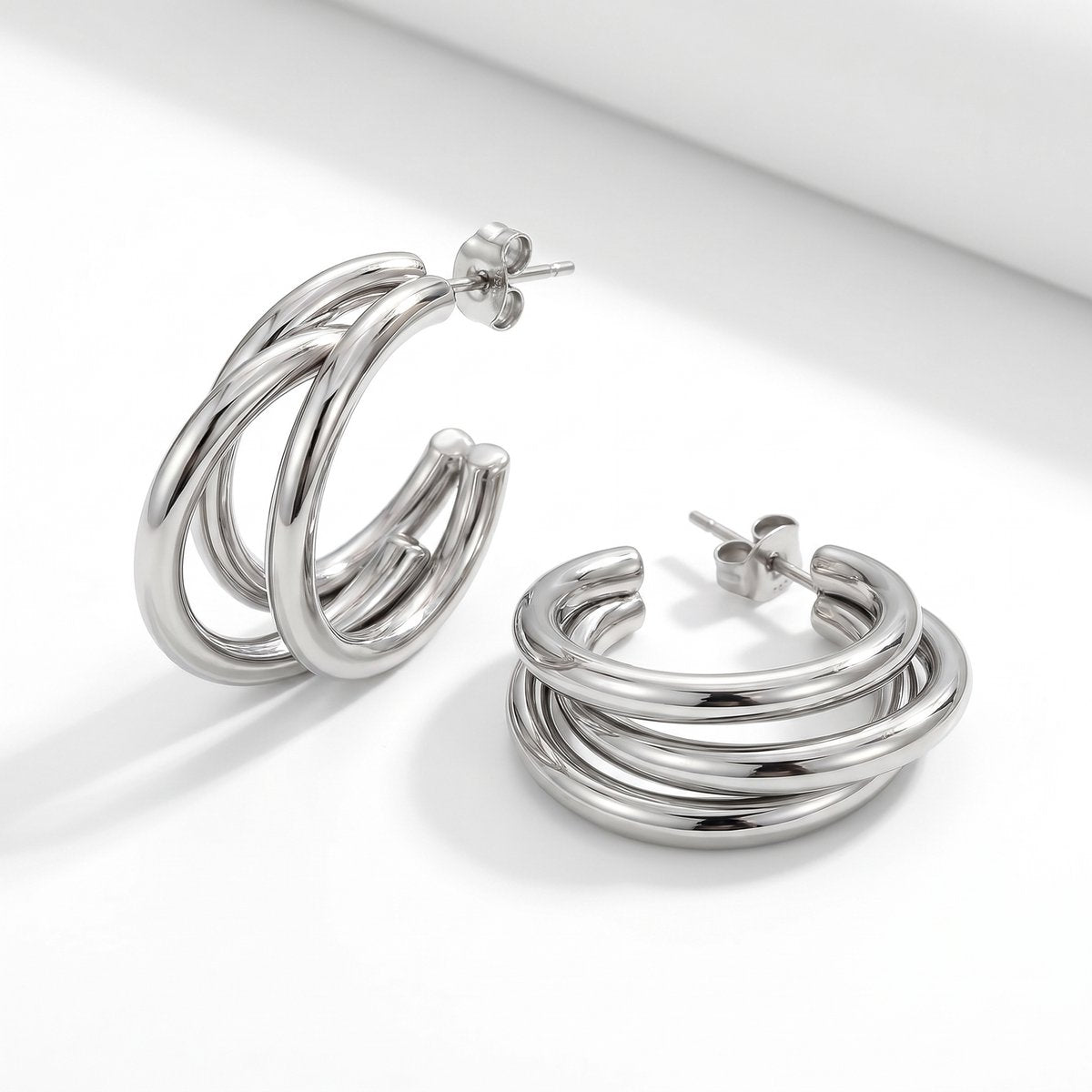 Lundholm Nika oorbellen zilver - drie bogen triple hoop stainless steel