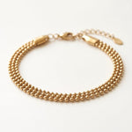 Lundholm Oda drielaagse bolletjesarmband goudkleurig
