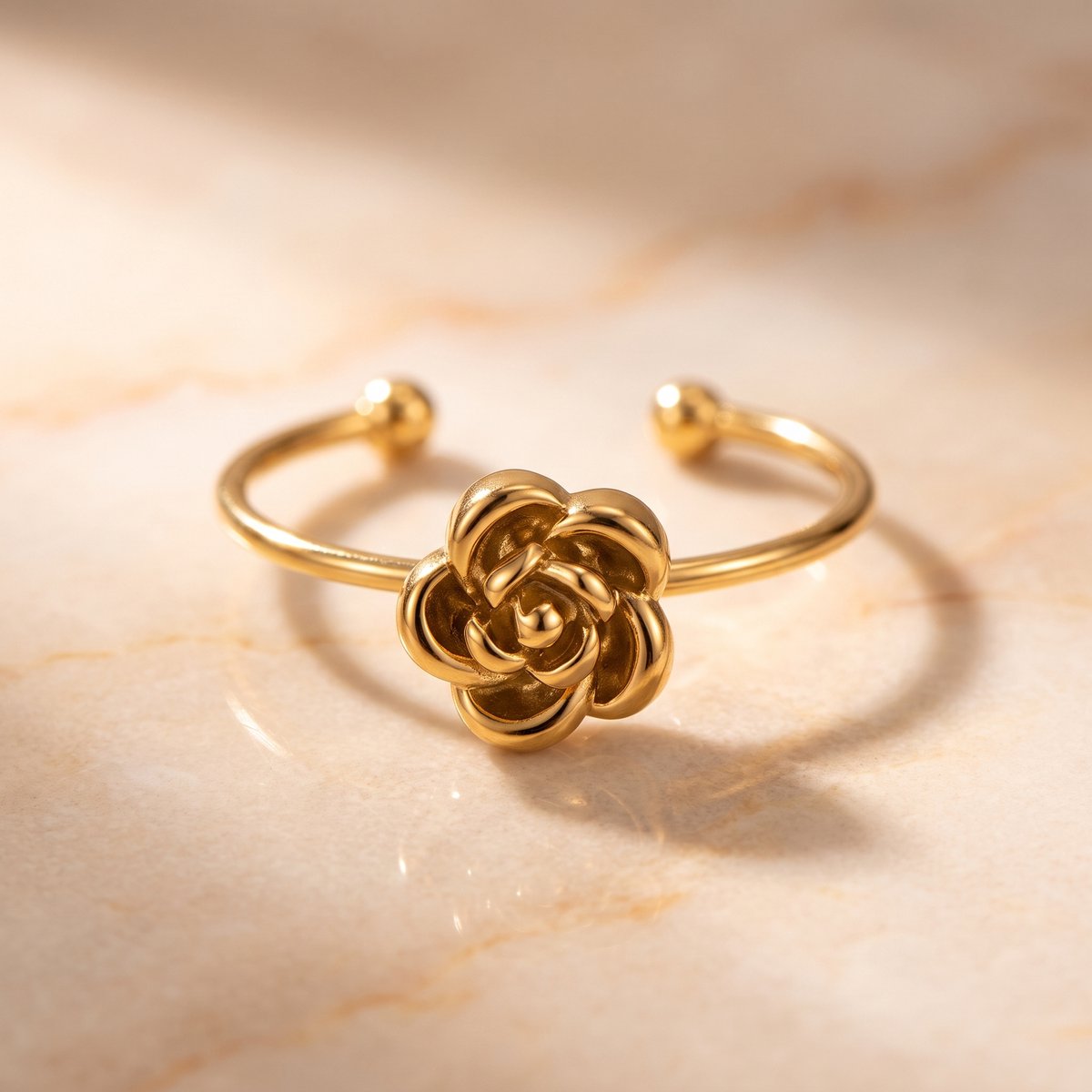 Lundholm Roos ring dames goudkleurig – open ring met roosje, gold PVD stainless steel