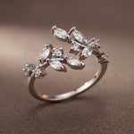 Lundholm Sanna ring dames zilverkleurig – verstelbare open ring met blad en zirkonia, stainless steel