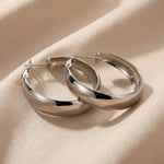 Lundholm Selja zilver chunky hoops detail — brede creole stainless steel dames Scandinavisch