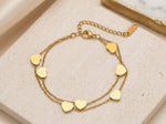 Lundholm Seya armband goudkleurig dubbellaagse bedelarmband met hartjes, romantisch sieraad cadeau voor haar