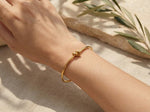 Lundholm Tammy gouden bangle met knoopdetail