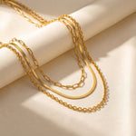 Lundholm Tove layered ketting goud detail — 3 lagen snake paperclip schakel gold plated stainless steel