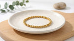 Lundholm Yuna kralenarmband goud detail — sprankelende premium stainless steel kralen elastisch koord