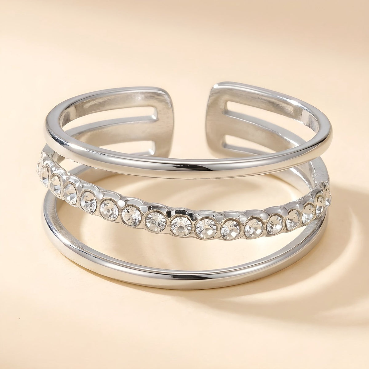 Lundholm Ziva ring dames zilverkleurig – verstelbare drielaagse ring met schuine rij zirkonia, stainless steel